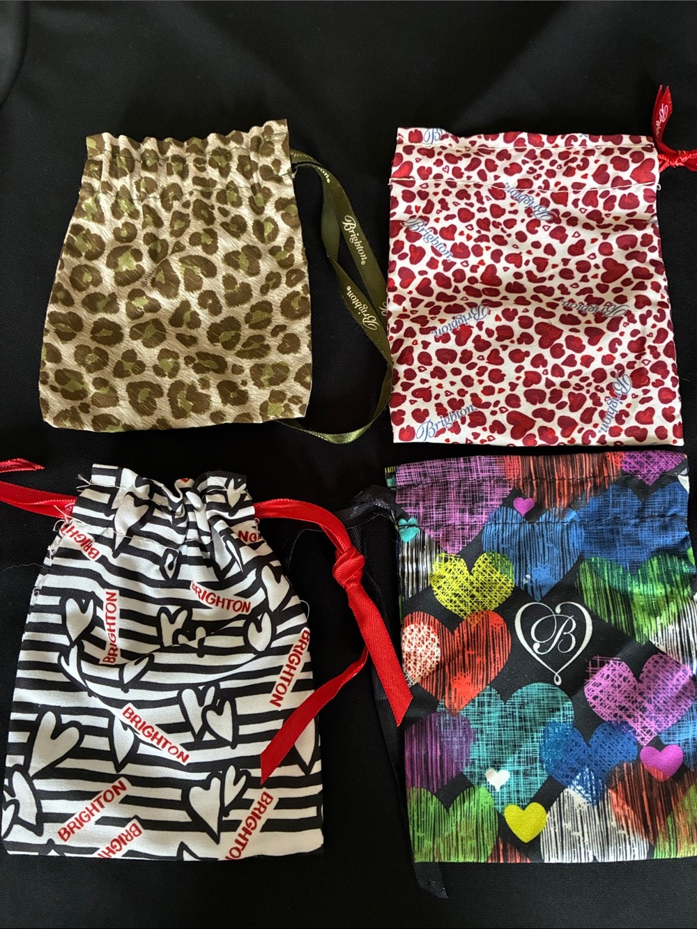 BRIGHTON Set of 4 jewelry bags, drawstring, multicolored.